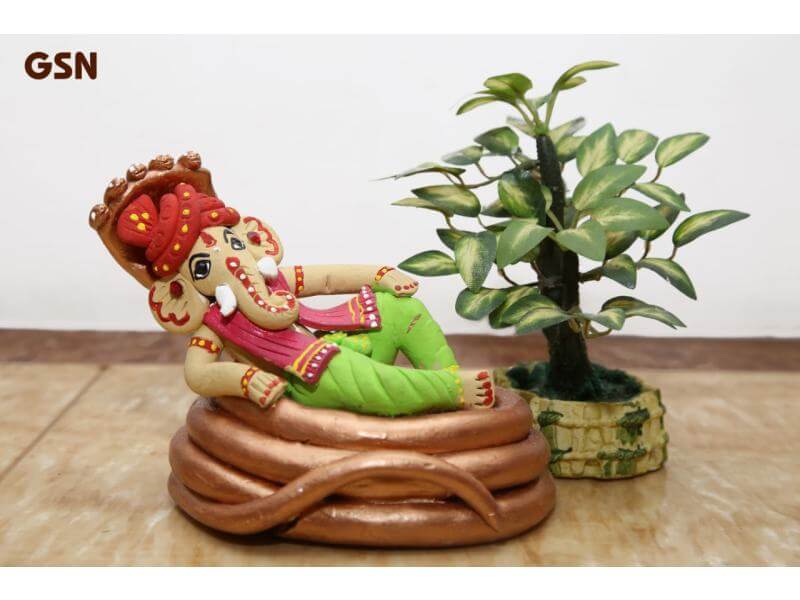 Terracotta Ganesh Sitting on Sheshnaag (Height: 5 Inch, Width: 5 Inch)