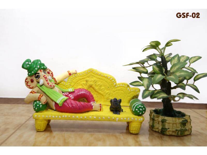 Terracotta Ganesh Sitting on Sofa (Height: 5 Inch, Width: 7 Inch)
